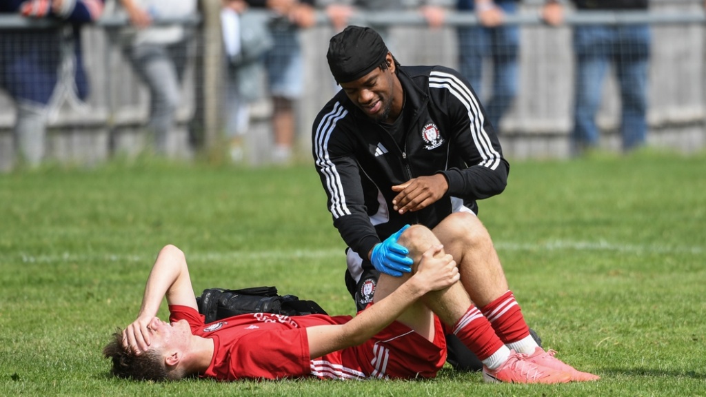 Hassocks physio Ash Cooper treats Joe Overy 