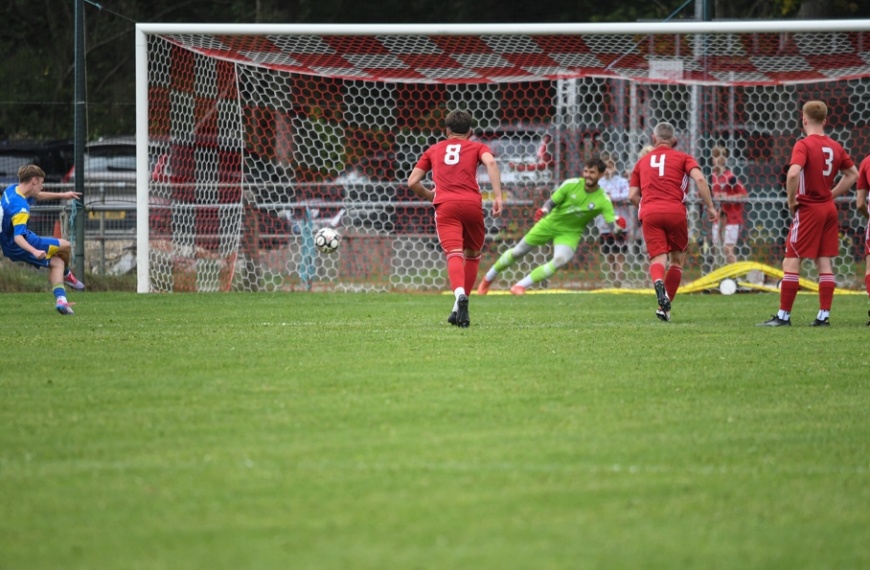 Jordan Brown saves a penalty for Hassocks in their 3-1 win over Petersfield Town