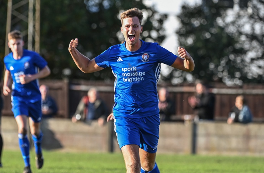 Morgan Vale celebrates scoring a penalty for Hassocks in their 2-0 FA Vase win at Camberley Town